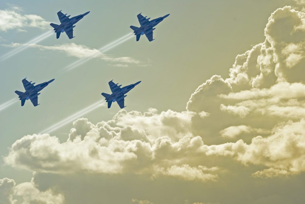 Image of air force jets flying across the sky. Represents Top Gun: Maverick and its use of deepfake technology.